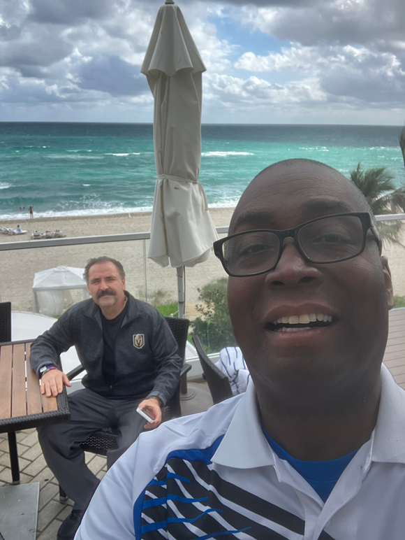 Kyle in In Miami Florida with Luis on a World Tour vacation